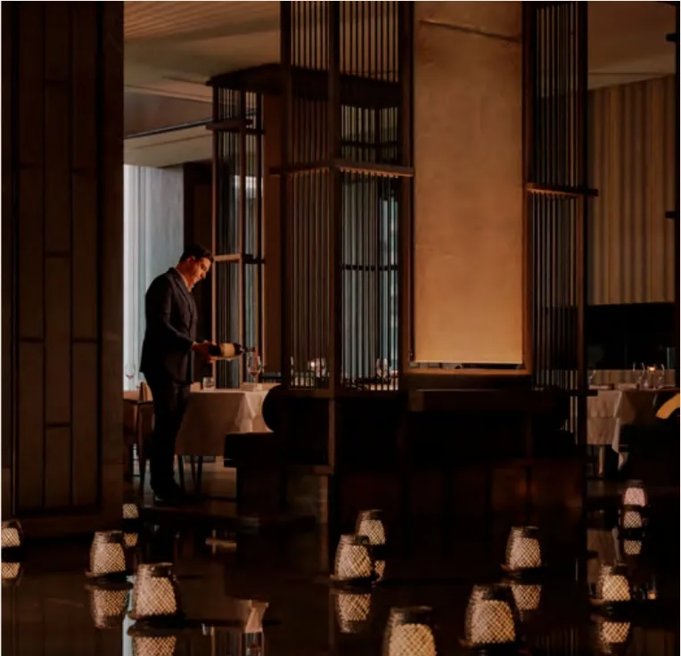 Candlelit dining room at Arva, Aman's signature Italian restaurant